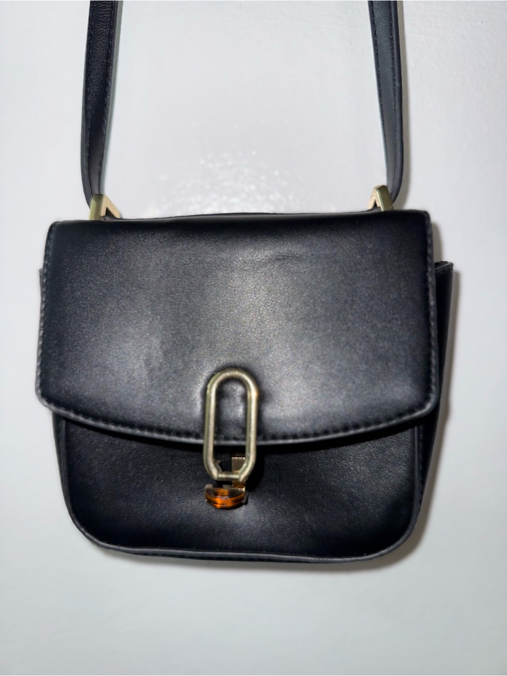 Target Black Crossbody Bag with Gold Hardware and Amber Accent